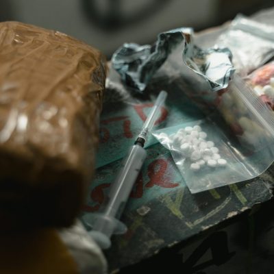 Picture of drugs and drug utensils representing drug charges Gold Coast